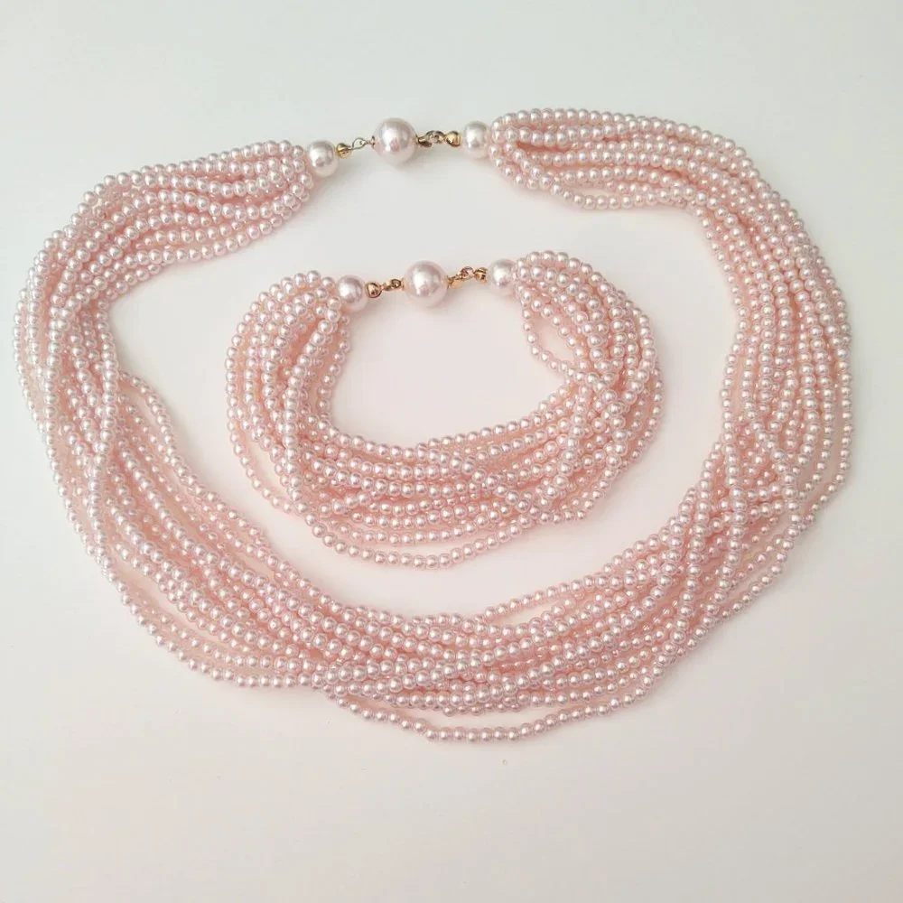Vintage multi strand pink beaded necklace and bracelet set